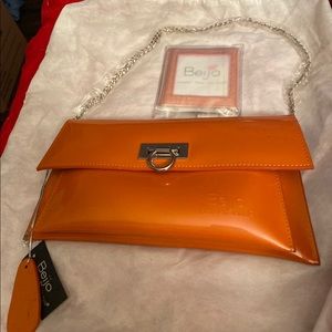 Orange Beijo clutch bag